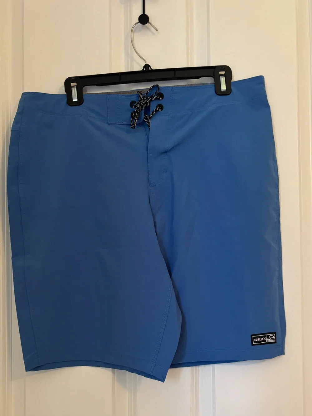 Hurley Men’s Royal Blue Boardshorts with Black Lace. Size 34.  Pocket. 9” inseam